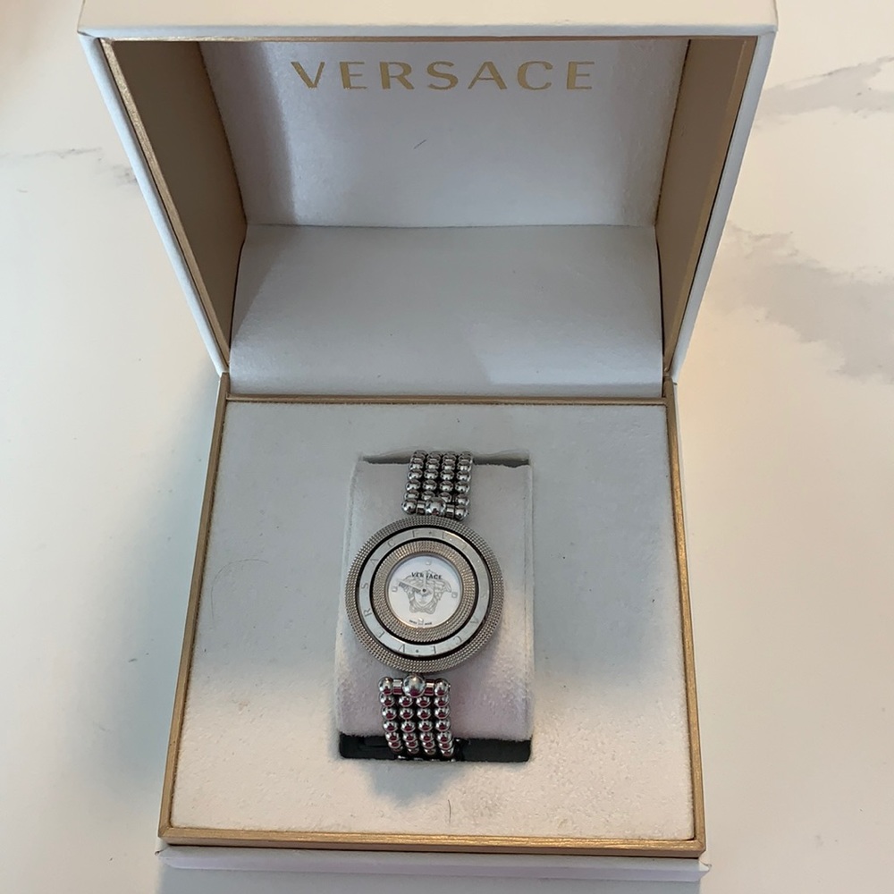 Stainless Versace rotating face watch